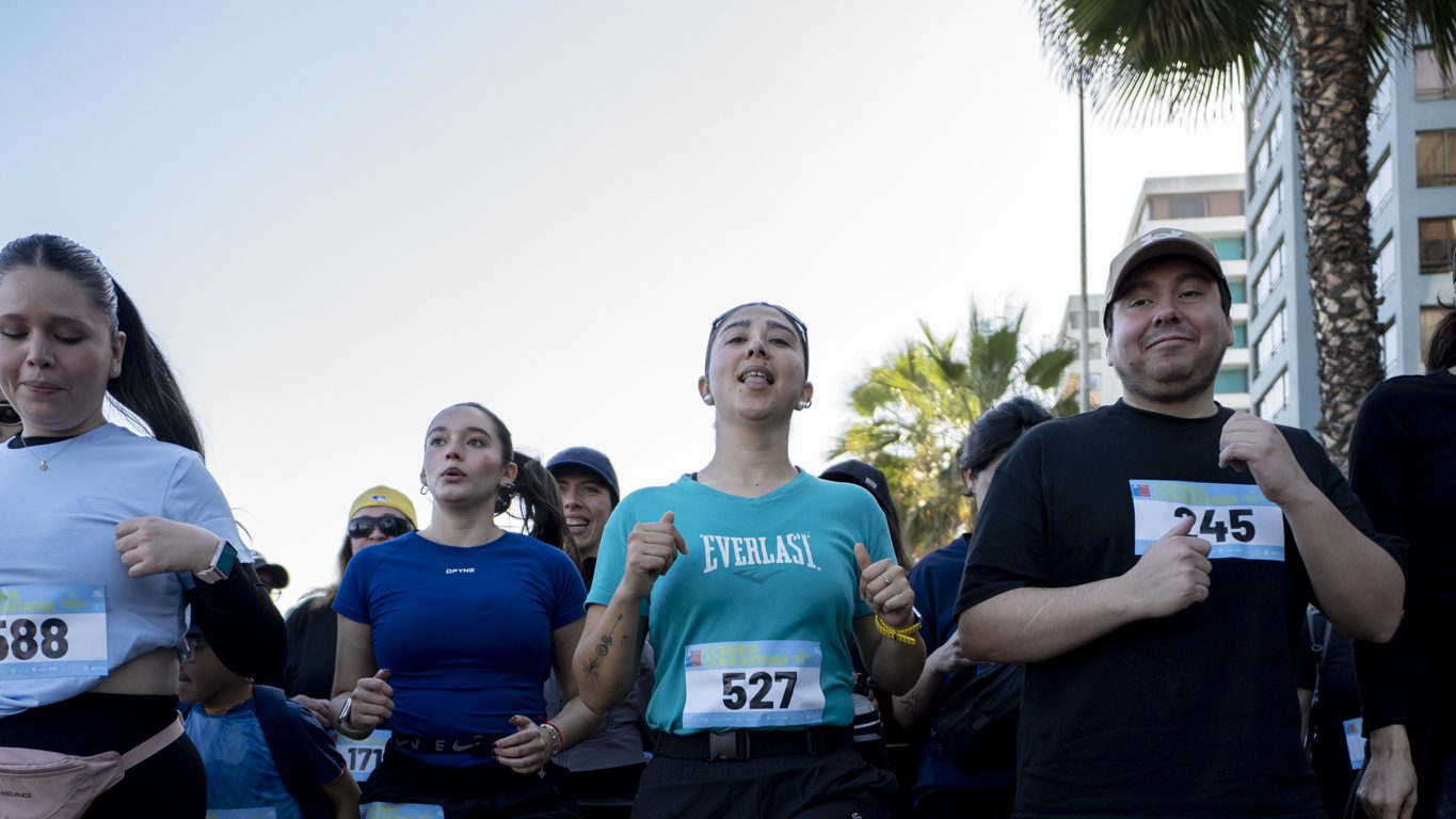 Grupo de corredores con su número puesto, en una corrida anterior